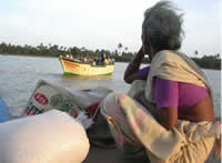 Woman waiting for relief after Tsunami